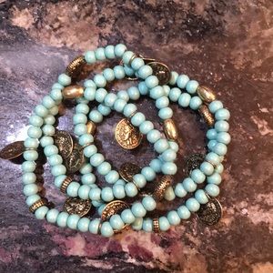 Set of four teal bracelets